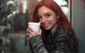 redhead girl with coffee